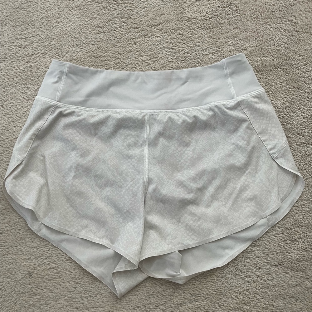 Athleta Run With It White Snakeprint 3.5 inseam shorts size XS